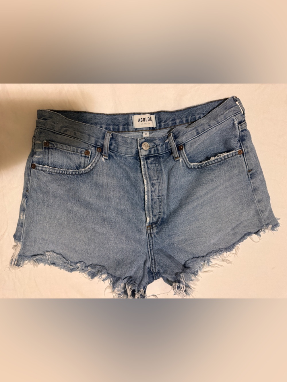 Agolde Light Blue Raw Hem Denim Cutoff Shorts